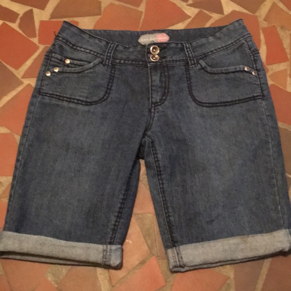 Pair of denim capris. Nice and soft, no rips.